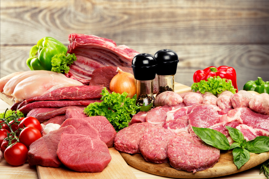 A table of red meats.