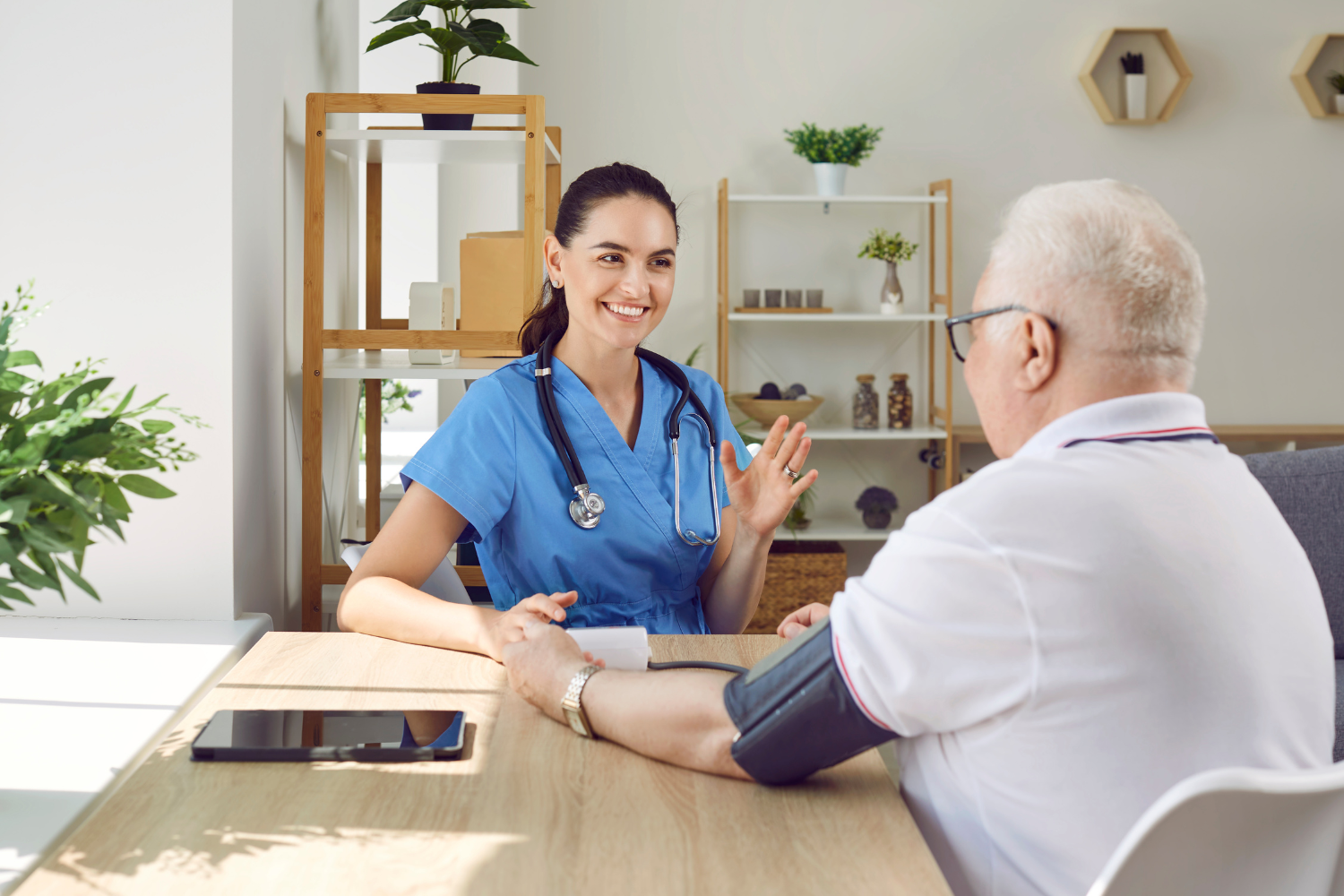 A healthcare professional speaking to a patient.