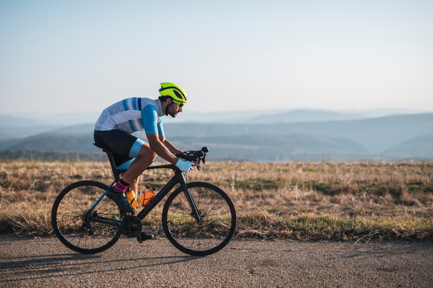 Man cycling as exercise for gout management.