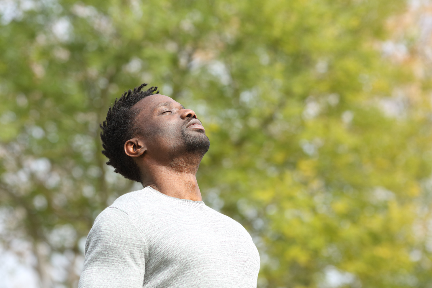 Man looking peaceful and health outdoors.